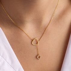 "Heart Lariat Necklace, Gold Heart Lariat, Stone Heart Necklace, Dainty Gold Lariat Necklace, Dangling Sterling Silver Necklace Dainty gold heart lariat necklace, perfect to wear by itself for a minimal look or layer it up with other necklaces. * All our jewelry is custom made by hand with care in our workshop The length option is the TOTAL chain length (including the charm). If you order an 18\" chain, the piece will come as CHAIN + CHARM = 18\". All pieces will come with a 1\" extension chain Trendy Gold Necklace, Sterling Silver Necklace Dainty, Doctor Jewelry, Lariat Necklace Gold, Heart Chain Necklace, Gold Lariat Necklace, Pretty Jewelry Necklaces, Jewel Necklace, Heart Chain