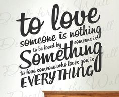 a wall decal with the words to love someone is nothing, and something else