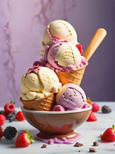 three scoops of ice cream in a bowl with strawberries and raspberries