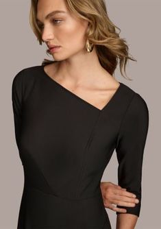 An asymmetrical neckline adds artful appeal to this sheath dress from Donna Karan. | Donna Karan New York Women's Asymmetric Neck Solid Sheath Dress, Black, 14 Elegant Asymmetrical Dress For Work, Elegant Asymmetrical Dress With Asymmetrical Neckline For Work, Elegant Fitted Asymmetrical Workwear Dress, Elegant Formal Asymmetrical Sheath Dress, Chic Fitted Asymmetrical Dress For Formal Occasions, Chic Fitted Asymmetrical Dress For Formal Events, Elegant Formal Sheath Asymmetrical Dress, Elegant Sheath Asymmetrical Work Dress, Elegant Sheath Asymmetrical Dress For Work