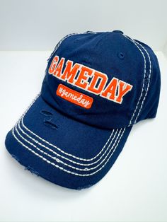 Introducing our Blue/Orange Gameday Ball Cap The perfect blend of sporty style and comfort, designed to make your game day outfit stand out. Whether you're cheering from the stands or running errands, these hats are a must-have for any fan. Key Features: Classic baseball cap design with an adjustable strap for a perfect fit High-quality, durable fabric for long-lasting wear Comfortable fit for all-day wear White stitching on hat gives it a fun look Fast shipping from Texas ensures you’re ready f Team-colored Cotton Baseball Cap For Game Day, Sporty Game Day Trucker Hat With Visor, Sports Fan Cap For Game Day, Sports Fan Visor Hat For Game Day, Game Day Cotton Baseball Cap In Team Colors, Blue Snapback Hat For Game Day, Sporty Blue Baseball Cap For College, Blue Casual Snapback Hat For Game Day, Blue Sports Fan Snapback Hat For Game Day