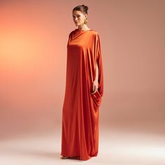 Indulge in luxury with our Silky Satin Maxi Kaftan. Made with the highest quality materials, this maxi kaftan effortlessly exudes elegance and sophistication. Embrace a sense of ease and style with this timeless piece. Maxi Kaftan, Satin Maxi, Timeless Pieces, Sense, Satin, Orange, High Quality