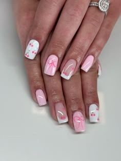 Pink nail art with bows and cherries. Perfect for breast cancer awareness month Nail Design Pink And White, Gel Nails With Bows, Acrylic Nail Designs Cherry, Pink French Tip With Initial, Nails With A Bow Design, Cherry Bow Nails, Cute Girly Nail Designs, Baby Pink Nails With Design Art Ideas, Nails Acrylic Bow