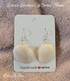 Explore and find your treasure awaiting. They one of a kind natural  shells earrings are going to light up your world. Theses unique earrings are the perfect beach trip accessory. Nickel-free Ocean-inspired Shell-shaped Shell, Ocean-inspired Nickel-free Shell-shaped Shell, Nickel-free Ocean-inspired Shell, Shell-shaped Jewelry With Matching Earrings For The Beach, Summer Shell Jewelry Gift, Handmade Silver Shell-shaped Earrings, Handmade Silver Shell Earrings, Adjustable Silver Shell-shaped Earrings, Handmade Silver Shell Drop Earrings