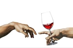 two hands reaching out to each other holding a wine glass with red liquid in it