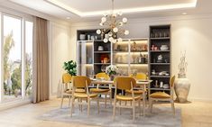 a dining room table with yellow chairs and shelves in the back ground, next to a bookcase full of books