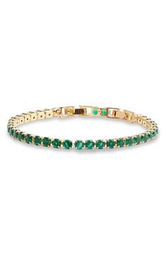 Prong-set round cubic zirconia illuminate a sparkly tennis bracelet that's perfect to stack or wear solo. 7" length; 2" extender; 1/8" width Fold-over clasp Goldtone plate or silvertone plate/cubic zirconia Imported Tennis Bracelet, Prong Setting, Cubic Zirconia, Silver Tone, Emerald, Tennis, Gold Tones, Nordstrom, Bracelet