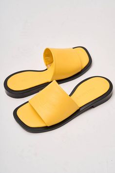 Heel height 0.8in Genuine Leather Lining - Genuine Leather Introducing the Alo Flop Flops, a vibrant and stylish addition to your summer wardrobe, proudly crafted by Fabio Monelli in Turkey using premium, natural leather. These flip-flops combine comfort and fashion effortlessly, making them an essential choice for any casual occasion. Trendy Yellow Leather Sandals, Summer Beach Flip Flops With Leather Lining, Summer Leather Lined Flip Flops For The Beach, Summer Vacation Flip Flops With Leather Lining, Leather Lined Flip Flops For Summer Beach, Summer Vacation Leather Lined Flip Flops, Trendy Leather Flip Flops With Textured Footbed, Yellow Sandals For Summer, Summer Leather Flip Flops With Flat Heel