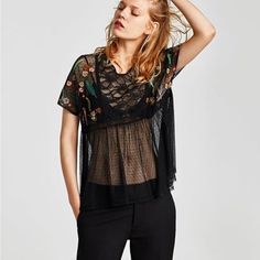 - Sheer Black Blouse By Zara - Loose Fit - Embroidered Flower And Feather Detailing On Sleeves - Lace Design On Top - Polka Dot Design On Bottom - Button Back Closure - Brand New With Tags Ships In 1-2 Business Days Measurements Approximate Open To Reasonable Offers. 15% Off Bundles Of 2+ Items. Save On Shipping! Black Sheer Mesh Top For Festival, Black V-neck Tops With Floral Embroidery, Black Lace Top With Short Sleeves, Black Lace Short Sleeve Tops, Black V-neck Blouse With Floral Embroidery, Black Short Sleeve Tops With Lace Patchwork, Black Lace Top With Lace Work, Black Embroidered Summer Blouse, Black Lace Top With Short Sleeves For Summer