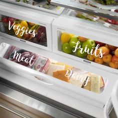 an open refrigerator with fruits and vegetables in it's doors that say, veggies, fruits, meat, and dairy