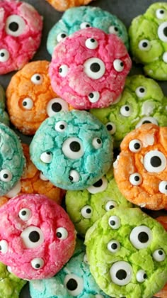 colorful cookies with eyes and googly eyes on them