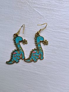 Adorable Floral Dinosuar Earrings Gold Earrings Gift Idea - Etsy Fun Handmade Metal Jewelry, Handmade Fun Metal Jewelry, Fun Nickel-free Metal Jewelry, Fun Single Earring As A Gift, Novelty Blue Drop Earrings, Blue Fun Drop Earrings, Blue Fun Dangle Jewelry, Blue Drop Earrings Fun Style, Fun Blue Dangle Jewelry