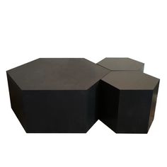 two black tables sitting next to each other