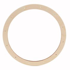 a wooden circle with holes in the middle