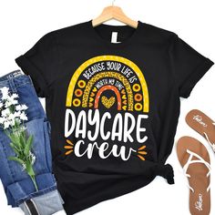 a t - shirt that says, because your feet are in the day care crew