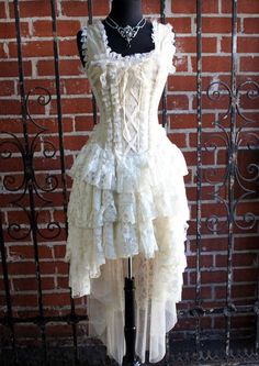 Elegant Cream Lace Corset Dress, Cream Wedding Corset Dress With Ruffles, Wedding Corset With Lace Bodice, Wedding Lace Corset With Lace Bodice, Wedding Lace Corset, Vintage Lace Overbust Corset, Vintage Lace Corset With Lace Trim, Vintage Lace Corset Dress With Lace Trim, Lace Underbust Corset For Wedding