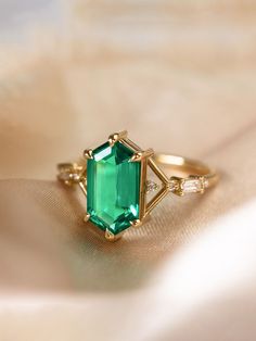 #hiddenspacejewelry #taurus #gemini #emeraldengagementring #weddingringset #uniquejewelry #diamondalternative #emeraldring #artdeco #summertime Modern Green Emerald Diamond Ring, Emerald Cut Baguette Diamonds May Birthstone Jewelry, Emerald Cut Baguette Diamond Jewelry For May Birthstone, Fine Jewelry With Baguette Diamonds And Emerald, Modern Green Emerald-cut Jewelry, Fine Jewelry Emerald With Baguette Diamonds, Baguette Cut Emerald Ring For May Birthstone, Green 14k Gold Jewelry With Baguette Diamonds, Fine Emerald Ring For Proposal