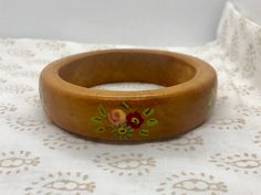 Rare, sweet find. Good condition. Flowers in various areas around the bracelet. Measurements shown in pics. Thanks for looking! Italian Minimalism, Bracelet Measurements, Sweet Flowers, Vintage Bangle Bracelets, Wood Bracelet, Vintage Bangles, Wood Jewelry, Bracelet Vintage, Vintage Magazines