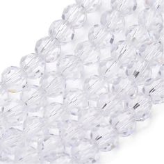 clear crystal faceted beads on white background