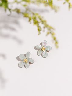 Introducing our  Floral Statement Stud Earrings, meticulously crafted to capture the essence of Spring and Summer in a delicate flowery design. Each pair of earrings is adorned with a floral/daisy motif, designed to evoke blooming flowers' vibrant colors and gentle allure. Handmade with precision and care, these earrings celebrate nature's beauty, bringing a touch of botanical elegance to any outfit. Our statement studs are crafted from acrylic and offer a perfect blend of durability and lightwe Delicate Drop Flower Earrings For Bridesmaid Gift, Delicate Birth Flower Earrings For Anniversary, Elegant Earrings With Handmade Flowers As Gift, Delicate Birth Flower Earrings, Feminine Flower Decorated Earrings For Gift, Feminine Handmade Flower Earrings For Gift, Handmade Feminine Flower Earrings For Gifts, Handmade Flower Earrings As Feminine Gift, Dainty Flower Earrings For Anniversary