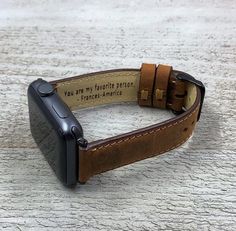 "Gifts for him, Leather Apple Watch Band 38 40 41 42 44mm 45mm, handmade strap, iwatch band, Free Engraving, Christmas Gift, anniversary gift Long Track Length: 4.5\"  Short Track Length: 3.5\"  Good for Apple Watch band Series 1 2 3 4 5 6 7, 8 & SE 38 mm 40 mm 41mm 42mm 44 mm or 45mm Four different color options for adapters (Silver, Black, Rose Gold, Gold). Different Color options for stitching. Our products are premium quality handmade leather goods. All of the leathers are processed in tradi Personalized Adjustable Apple Watch Band For Gift, Leather Apple Watch Band Perfect As A Gift, Personalized Adjustable Apple Watch Band As Gift, Personalized Adjustable Apple Watch Band Gift, Personalized Apple Watch Band Gift, Vintage Watch Bands With Waxed Finish, Vintage Waxed Finish Watch Bands As Gift, Rectangular Brown Watch Bands For Gift, Rectangular Brown Watch Bands As Gift