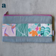 A strip of patchwork accented by a dusty blue-colored cotton linen makes for a cute pencil case! This slim pencil pouch is perfectly sized to hold all your favorite school and office supplies - pencils, pens, markers, scissors, etc. It can also be used as a cosmetics bag or tiny clutch! This listing is updated regularly with available pencil cases. Shown pencil case is a sample only, zipper color may be different but will still match the patchwork prints. No two pencil cases are the same. Produc Multicolor Rectangular Stationery Case For Daily Use, Multicolor Zipper Pouch Pencil Case For Organization, Green Zipper Pouch Stationery Gift, Multicolor Pouch Pen Holder, Green Rectangular Zipper Pouch Stationery, Multicolor Stationery Pouch With Pen Holders, Multicolor Rectangular Pencil Case For Crafting, Green Rectangular Stationery Zipper Pouch, Multicolor Zipper Pouch Pencil Case For Crafting