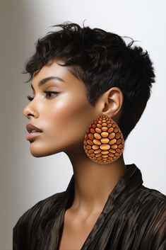 Make a bold statement with the Wild Beauty Earrings! These stunning earrings feature a unique blend of resin and copper foil, capturing light with every angle. Designed to turn heads, they come in both post and clip-on styles for versatile wear. With dimensions of 3.14 inches in length and 2.55 inches in width, these earrings are lightweight yet eye-catching, weighing only 15 grams.   Wild Beauty Earrings, statement earrings, copper foil earrings, resin earrings, clip-on earrings, post earrings Big Statement Earrings, Statement Outfit, Beauty Features, African Earrings, Wild Beauty, Geometric Circle, Short Styles, Copper Foil, Fashion Board