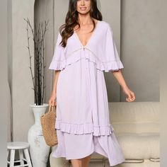 Lavender Midi Dress Brand New Still Tags! Lavender V-neck Maxi Dress For Spring, Chic Lavender Midi Dress With Ruffles, Feminine Lavender Maxi Dress With Ruffles, Chic Mauve Midi Dress For Brunch, Lavender Flowy Maxi Dress For Spring, Spring Mauve Midi Dress, Purple Midi Dress For Summer Day Out, Lavender Midi Dress With Ruffles, Mauve V-neck Midi Dress For Spring