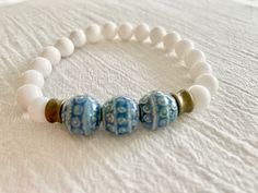 Beaded Bracelet Unique Jewelry Mens Bracelets Handmade - Etsy Bohemian Round Stretch Bracelet For Beach, White Bohemian Stretch Bracelet For Friendship, Bohemian Hypoallergenic Beaded Bracelets, White Bohemian Stretch Bracelet For Meditation, Bohemian Stretch Bracelet For Beach, Bohemian Hypoallergenic Bracelets, Spiritual White Stretch Bracelet For Beach, Bohemian Blue Stretch Bracelet For Everyday, Bohemian Blue Hypoallergenic Beaded Bracelets