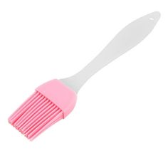 a pink and white brush on a white background