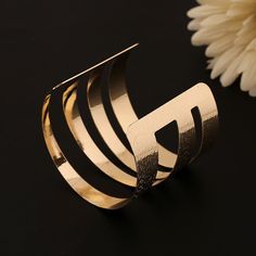 Elegant Geometric Bracelets Gift, Elegant Geometric Bracelets For Gift, Elegant Geometric Bracelets For Gifts, Modern Geometric Gold Jewelry, Gold Geometric Metal Jewelry, Gold Geometric Bracelet For Gift, Elegant Adjustable Geometric Bracelet, Adjustable Geometric Gold Jewelry, Gold Geometric Jewelry For Party