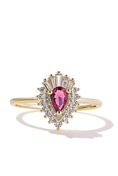 Tap into your sexy, royal-worthy energy with our Baywatch ring. This yellow gold ring features a romantic magenta stone encaged in white stones and baguettes. Its eye-catching appearance is not for the faint of heart, making it perfect for those who want to secure their “all eyes on me” fate wherever they go. Ring Details Design: Hot pink crystal with white side crystals Dimensions: 14mm height Metal: 3x dipped 14k gold over hypoallergenic brass. High quality plating details below Crystals: Excl Gold Ruby Ring With Vs Clarity, Gold Ruby Gemstone Ring For Parties, Elegant Ruby Crystal Ring, Magenta Crystal, Eyes On Me, White Stones, All Eyes On Me, Moonstone Crystal, Baywatch