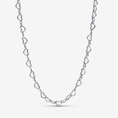 Go for delicate elegance when you choose the Linked Hearts Collier Necklace. Tiny sterling silver linked hearts form an adjustable chain necklace. This design takes a classic shape and reinvents it in the form of a scaled-down, repeat pattern. Equal parts sweet and sophisticated, this sleek sterling silver heart necklace will become a core component of any jewelry collection. Wear with a maximum of 1-2 charms/dangle charms. - Pandora Linked Hearts Collier Necklace - Sterling silver - Sz. 17.7 in Pearl Diamond Jewelry, Custom Charm Bracelet, Pandora Necklace, Charms Pandora, Sterling Silver Heart Necklace, Gold Armband, Solid Gold Necklace, Solid Gold Earrings, Necklace Heart