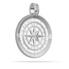 a silver compass pendant on a white background