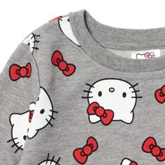 Your Hello Kitty fan is ready for a fun day with her favorite kawaii cartoon character. Perfect for chilly days, this warm pullover sweatshirt features a pretty all-over print of red bows and Hello Kitty's adorable cat face. Made of a soft material that keeps your little girl comfortable, this stylish Hello Kitty sweatshirt is part of the perfect cute and cozy winter outfit. Cute Winter Character Print Sweatshirt, Cute Winter Sweatshirt With Character Print, Cute Long Sleeve Sweatshirt With Character Print, Playful Long Sleeve Sweatshirt With Character Print, Cute Long Sleeve Sweatshirt With Cartoon Print, Hello Kitty Cotton Sweatshirt In Kawaii Style, Cute Long Sleeve Sweatshirt With Cat Print, Cute Hello Kitty Print Crew Neck Sweatshirt, Cute Cotton Sweatshirt With Hello Kitty Print