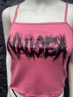 This is a pink Nausea crop tank top with spaghetti straps. This has a Nausea image screen printed on the front. 57% cotton/ 38% polyester/ 5% Spandex These are handmade screenprinted and slightly vary from the photo. Please feel free to email me any questions. Thanks for looking. I do not do exchanges and I do not take returns unless the item is damaged. I thoroughly check each item before it is shipped out. The seller is not responsible for any lost or stolen packages. Trendy Screen Print Tank Top For Spring, Y2k Tank Top For Spring Alternative Fashion, Spring Y2k Tank Top For Alternative Fashion, Y2k Style Tank Top For Spring Alternative Fashion, Trendy Graphic Print Crop Top For Alternative Fashion, Edgy Pink Summer Tops, Pink Sleeveless Y2k Crop Top, Summer Streetwear Tank Crop Top, Fitted Pink Tank Top For Streetwear