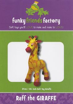 a stuffed giraffe is in the package