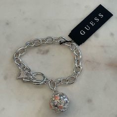 Guess Silver Gotta Have A Ball Pink Heart Charm Bracelet Love Valentine’s Guess Gotta Have A Ball Heart Shapes On Charm Ball Charm Bracelet Silver New With Tags Retail Value:$28 New With Tags Approximate Dimensions: 8” Silver Heart Charm Bracelet For Party, Silver Bracelets For Valentine's Day Party, Silver Heart Bracelet For Valentine's Day Party, Gold And Silver Watch, Charm Bracelet Silver, Double Chain Bracelet, Guess Jewelry, Bracelet Set Silver, Silver Heart Bracelet