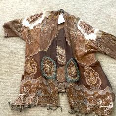 Beautiful Handmade Embroidery Jacket Nwt!! Stunning Lightweight Jacket $149. One Size Fits All. I Purchased This In Laguna Beach. Fast Shipping! This Is A Statement Piece. Brown Long Sleeve Outerwear With Floral Embroidery, Brown Floral Embroidered Fall Outerwear, Brown Floral Embroidered Outerwear For Fall, Brown Floral Embroidery Outerwear For Fall, Bohemian Embroidered Kimono For Fall, Bohemian Kimono With Multicolor Embroidery For Fall, Bohemian Long Sleeve Outerwear With Intricate Embroidery, Bohemian Shawl Outerwear For Spring, Casual Fall Kimono With Floral Embroidery