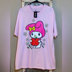 Need Some More Kawaii Sanrio Style In Your Closet? My Melody's Got Your Back... And Your Front! Rep Your Favorite Sanrio Pal With This Tee, Featuring A Jumbo Print Of My Melody On The Front And Back, Holding An Apple And With Flowers In The Background. Thick Cotton With A Nice Generous Oversized Fit! Kawaii Cartoon Print Relaxed Fit T-shirt, Kawaii Style Cartoon Print Relaxed Fit T-shirt, Pink Crew Neck T-shirt With Cute Design, Harajuku Style Tops With Funny Print For Spring, Casual Spring T-shirt With Cute Design, Casual Pink Hello Kitty T-shirt, Spring Pink T-shirt With Hello Kitty Print, Oversized Kawaii Tops With Graphic Print, Oversized Graphic Print Kawaii Tops