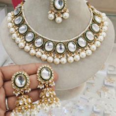 Gold Rodium Polish White and Off White color Necklace in Metal Alloy studded with Kundan, Pearl Luxury White Kundan Necklace With Stone Work, White Stone Traditional Necklace, Luxury White Elegant Kundan Necklace, Luxury White Kundan Necklace For Wedding, Luxury White Kundan Necklace In 22k Gold, Luxury White 22k Gold Kundan Necklace, Maroon Necklace, Violet Necklace, Engagement Reception