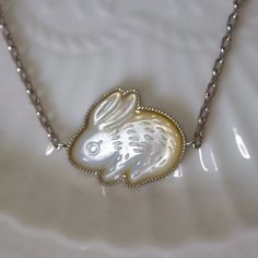 Mother of Pearl Bunny Necklace. Pet Jewelry. Rabbit Owner Gift - Etsy White Polished Mother Of Pearl Necklace, Exquisite Engraved White Jewelry, Exquisite White Engraved Jewelry, Delicate Mother Of Pearl Jewelry In Pearl White, Exquisite Pearl White Pearl Necklace Gift, Exquisite Pearl White Pearl Necklace For Gift, Exquisite Pearl White Pearl Necklace As Gift, Delicate Mother Of Pearl Jewelry For Formal Occasions, Dainty Pearl White Mother Of Pearl Jewelry