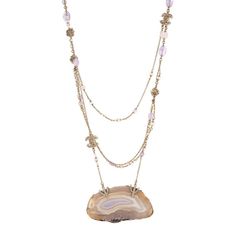 Pre-owned Chanel multi-strand necklace crafted in champagne-hued yellow tone (circa 2012).    The necklace has multiple strands embellished with sparkling crystals, terminating with a large piece of agate at the base (measures 3 1/2 x 2 inches). Measuring 35 inches in length the necklace is slightly adjustable to 34 inches. The stones are in very good condition (no chips or flaking). Dating to the 2012 autumn collection the necklace makes a great statement with soft hues of lilac and shimmering crystals.    The necklace is in very good condition showing minimal wear.    Particulars:    Weight: 119.1 grams    Size & Measurements: The necklace measures 35 inches in length and is slightly adjustable to 34 inches. The agate measures 3 1/2 x 2 inches.    Metal & Hallmark: Light yellow-gold tone Multi Strand Necklace Gold, Yellow Tone, Autumn Collection, Necklace Craft, Yellow Tones, Modern Necklaces, Necklace Long, Accessories Jewelry Necklace, Multi Strand Necklace