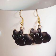 Loafing Kitty Earrings Dangle Hanging Cat Earrings Gift for - Etsy Cat Design Metal Drop Earrings, Metal Cat Design Drop Earrings, Cat Design Earrings With Cat Ears For Gifts, Cat Design Earrings With Cat Ears Shape For Gift, Cat Design Earrings With Cat Ears, Cute Black Pierced Jewelry, Hypoallergenic Cat Ears Jewelry For Gift, Black Cat Ears Jewelry For Gifts, Novelty Cat Ears Jewelry Gift