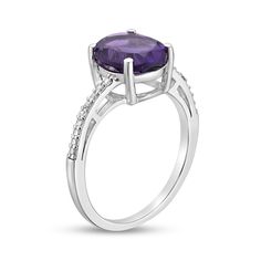 Bold, classic and simply stunning, this beautiful fashion ring will delight the February-born birthday girl. Finely crafted in sleek sterling silver, this ring features an exquisite 10.0 x 8.0mm oval-shaped luxe purple amethyst embraced by the gracefully bypassing beaded and diamond-accented shank. An elegant look she's certain to treasure, this ring is finished with a bright polished shine. This ring is custom-made to fit her ring size. Sterling silver rings cannot be resized after purchase. Classic Oval Amethyst Ring With Accent Stones, Formal Oval Cabochon Ring With Center Stone, Classic Oval Amethyst Ring With Prong Setting, Elegant Sterling Silver Amethyst Promise Ring, Classic Promise Amethyst Ring With Prong Setting, Polished Finish Birthstone Promise Ring, Elegant Amethyst Ring With Center Stone, Elegant Oval Rings With Accent Stones, Oval Amethyst Sterling Silver Ring For Formal Occasions