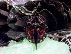 This vampire necklace contains a mix of dragon's blood resin and rose petals sealed under resin. Gothic Cross Necklace, Vampire Necklace, Gothic Pendant, Goth Necklace, Gothic Cross, Gothic Crosses, Necklace Gothic, Dragons Blood, Dracula