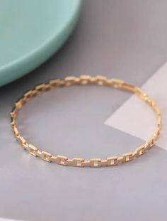 custom order 5-6 weeks  length 18.3cm  width 3.88mm  x 1.5mm  Material: 14 karat. Only solid gold. NO gold filled / NO gold plating   Gold Info:  24K gold is 100% pure 18K contains 75% gold and 25% alloyed metals 14K is 58.5% gold and 41.5% alloyed metals 9K contains 9 parts pure gold and 15 parts additional metals such as silver, tin, nickel, zinc, palladium, etc. ----------------------------------------------------------------------  quality, simplicity, reasonable price For questions or inquiry please do not hesitate to contact us. We will be happy to assist you.  SHIPPING: 1. Shipping takes approximately 3-5 business days (exclude weekend and holiday) for domestic customer.  Shipping via USPS five days a week Monday to Friday and comes with insurance.  You can track the parcel at USPS. Minimalist Chain Bracelet With Box Chain Bangle, Minimalist Bangle Chain Bracelet With Box Chain, Minimalist Gold Bangle Bracelet With Box Chain, Minimalist Gold Chain Bangle Bracelet, Minimalist Bangle Bracelet With Box Chain, Minimalist Round Box Chain Bracelet, Jewelry Minimal, Real Gold Chains, Solid Gold Chains