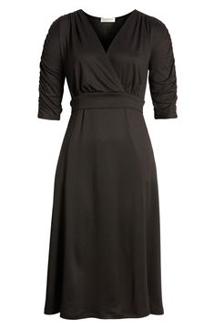 Getting ready for your next event is easy in this effortless wrap dress that has a classic color and flattering A-line silhouette. 40" length Surplice V-neck Three-quarter sleeves 95% polyester, 5% spandex Machine wash, dry flat Made in the USA of imported fabric Nordstrom Dresses, Three Quarter Sleeves, Getting Ready, Three Quarter, Black Noir, Wrap Dress, A Line, Nordstrom, Spandex