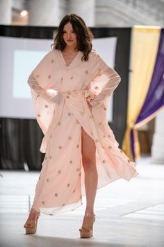 Beyond its role as a stunning bridal accessory, this Blush Pink Robe with Gold Zari Details seamlessly transitions into a versatile wardrobe essential. Picture yourself lounging in style on lazy Sunday mornings, sipping coffee and embracing the comfort of this luxurious robe. It becomes a statement piece for spa days at home, transforming ordinary self-care routines into moments of pure indulgence. Effortlessly elevate your loungewear game by pairing it with your favorite pajamas or silky loungi Elegant V-neck Kimono For Wedding, Elegant V-neck Wedding Kimono, Elegant Summer Festive Kimono, Bohemian Maxi Dress With Traditional Drape For Weddings, Bohemian Wedding Maxi Dress With Traditional Drape, Elegant Wedding Kaftan With Sheer Dupatta, Elegant Summer Wedding Kimono, Elegant Spring Wedding Kimono, Festive V-neck Wedding Kaftan