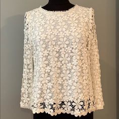 New With Tags Ivory Floral Crochet Blouse Size Medium Body Lined, Sleeves Are Not Lined See Photos For Measurements And All Measurements Are Taken Flat And Approximate Chic White Scalloped Lace Top, Elegant Lace Top With Crochet Trim, Elegant White Crochet Top With Lace Patchwork, Elegant Cream Crochet Top For Spring, Feminine White Crochet Lace Top, White Feminine Lace Crochet Top, Spring Lace Crochet Top With Lace Work, Spring Crochet Lace Top With Lace Work, Feminine White Lace Crochet Top